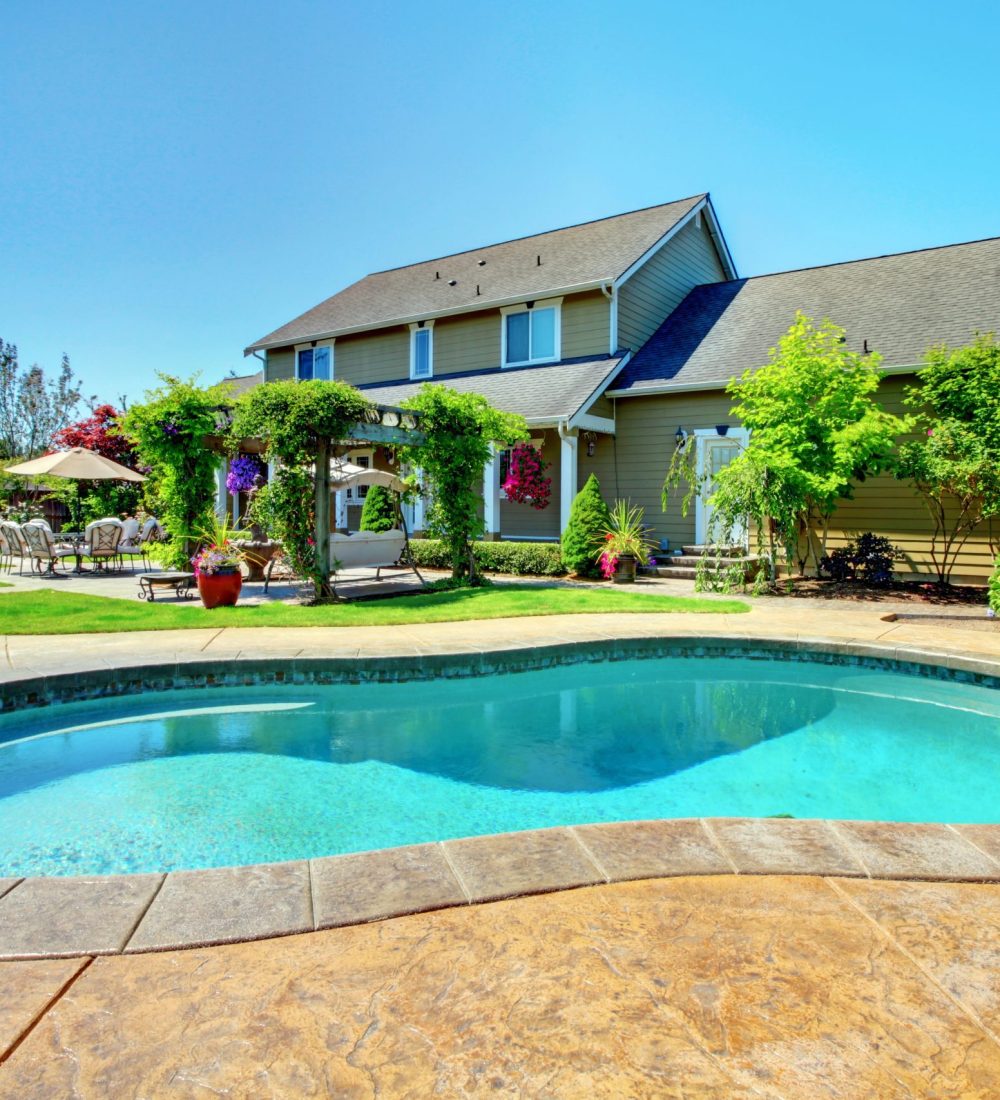 Luxury American farmhouse with backyard pool premium residential pool installation