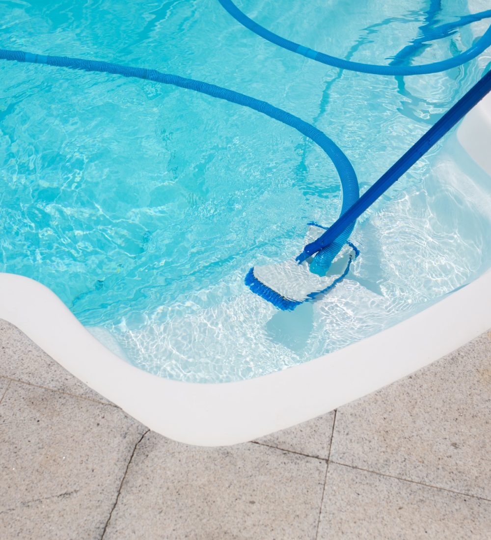 cleaning pool with vacuum cleaner. Cleaning equipment for small pools.